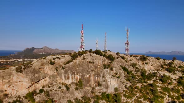 Spanish City By The Sea Reveals Behind Mountain With Antennas alt