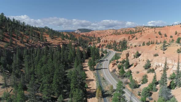 Bryce Canyon.  Aerial Over the Road at Beautiful Red Rock Formations, Utah USA alt