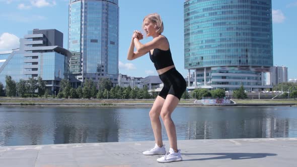 Woman working out in city