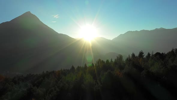 Sun Rising over the Mountain Ranges in Austria alt