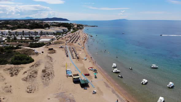 Aerial footage of the beautiful small town known as St George South, Greek city of Corfu alt