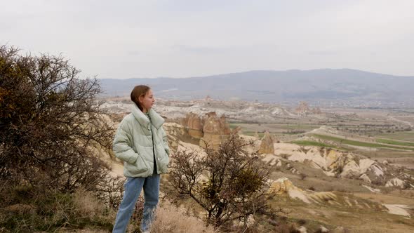 Teen Girl Standing on Mountain Edge Rose Valley Landscape alt