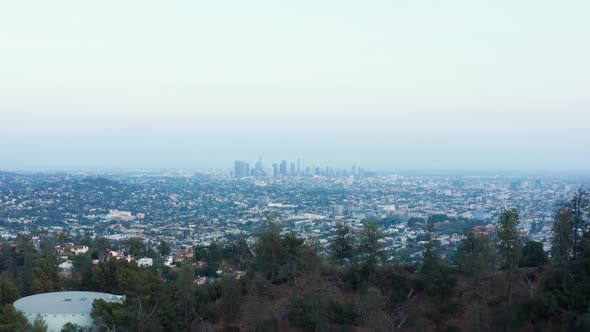 Urban aerial view of beautiful and scenic downtown Los Angeles on blue sky.  alt