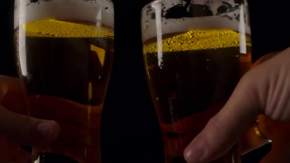 Crop People Clinking Beer Glasses alt