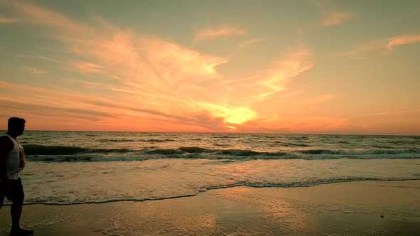 Ultra Wide Shot of Dramatic Sea Sunrise alt