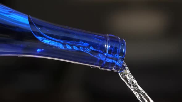 Water Pouring From a glass Bottle alt