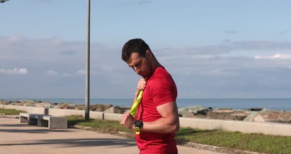 Young strong sporty athletic fit sportsman man in sports clothes warm up training. alt