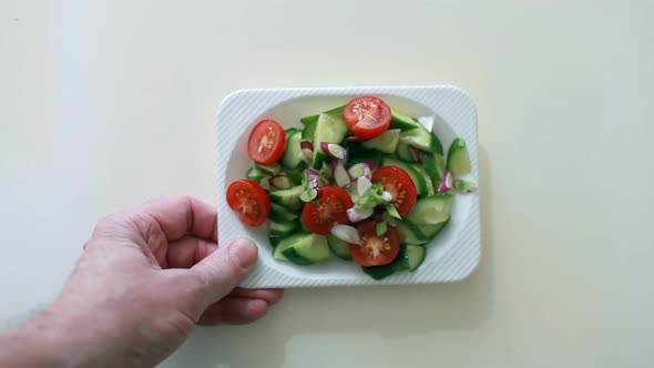 salad of fresh cucumbers, cherry tomatoes and green onions