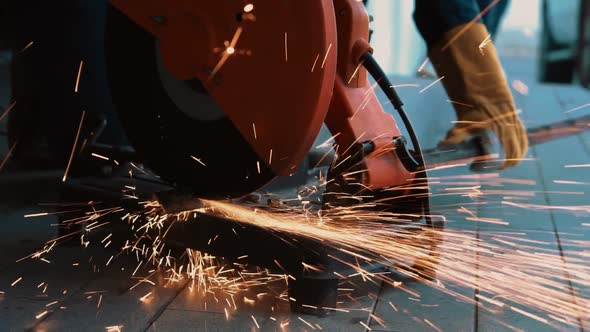 Professional Mechanic is Cutting Steel Metal alt