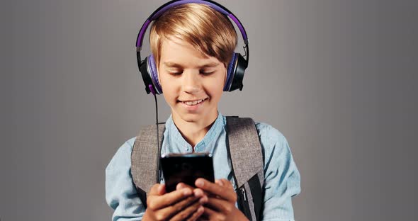 Boy Listening To Music Isolated