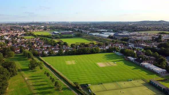 Aerial shot of a beautiful urban town in North London on a summer day, England alt