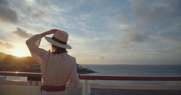 Attractive passenger looking at the mountain. Shot on Black Magic Cinema Camera alt