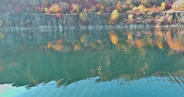 View of the Lake in a Granite Quarry As It Looks From Above alt