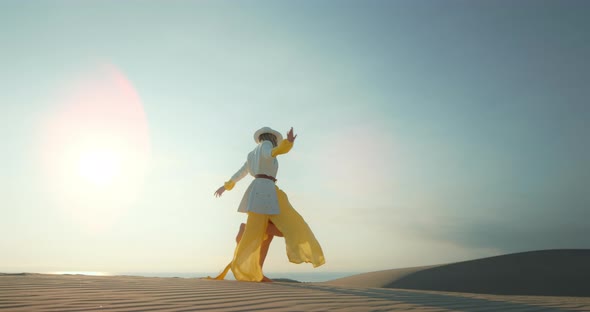 Dancing Woman, Slow Motion Stylish Girl in Dress, Coat and Hat, Having Fun alt