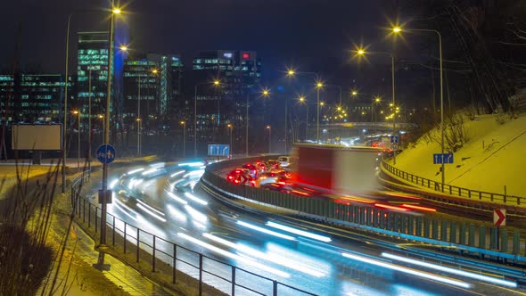 Evening traffic in downtown, time-lapse alt
