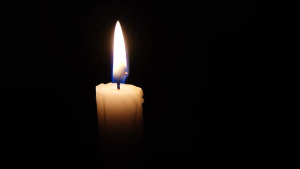 a Lonely Burning Candle in the Dark