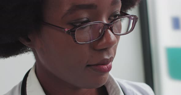 Close Up Portrait of African American Family Medical Doctor in Glasses alt