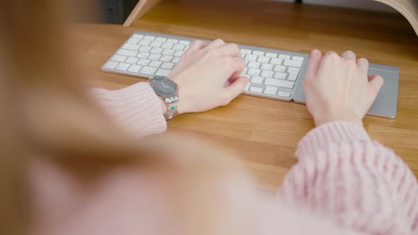 Female Video Editor or Blogger Hands on Keyboard in Home Office Workplace