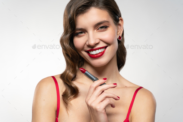 Elegant Woman With Red Lips Holding Lipstick In Hand Stock Photo By