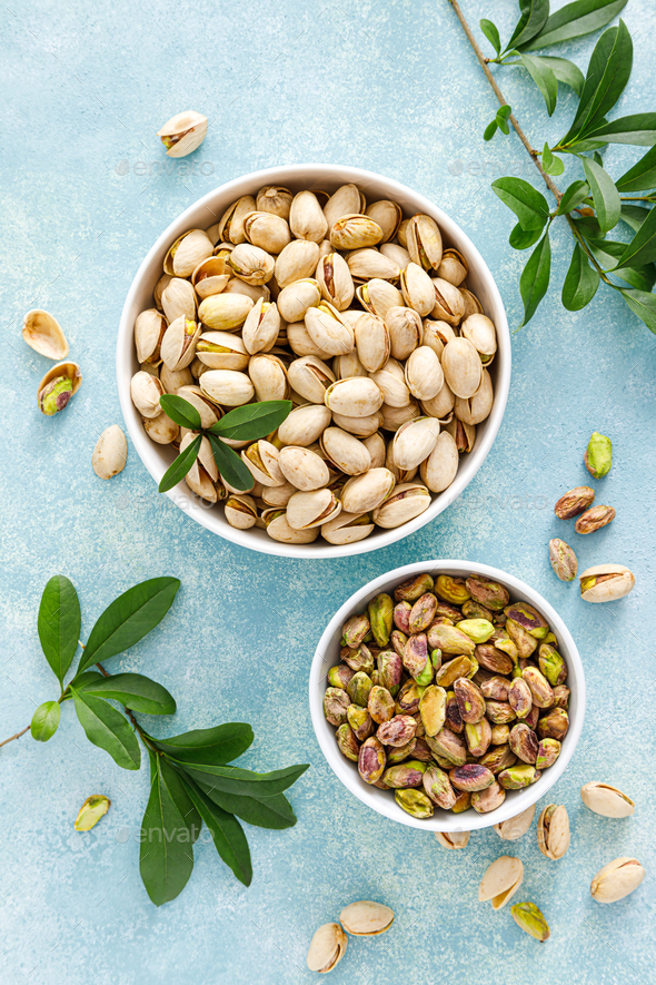 Pistachios. Whole pistachios with green leaves and pistachio nut