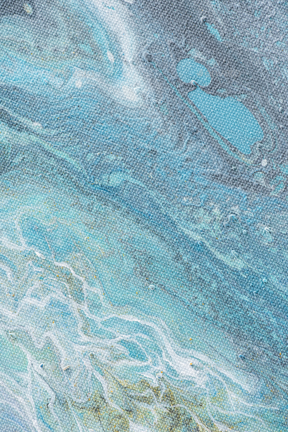 close up of abstract creative background with light blue oil paint