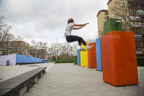 series of photos of young man jumping 4 of 8