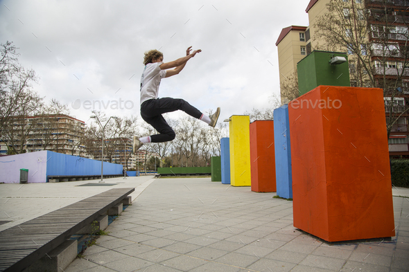 series of photos of young man jumping 3 of 8