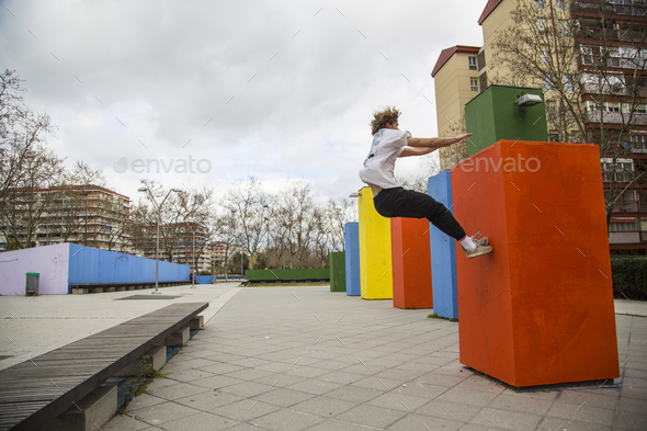 series of photos of young man jumping 5 of 8