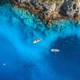 Aerial view of people on floating sup boards on blue sea - PhotoDune Item for Sale