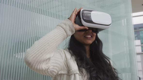 Woman wearing VR goggles