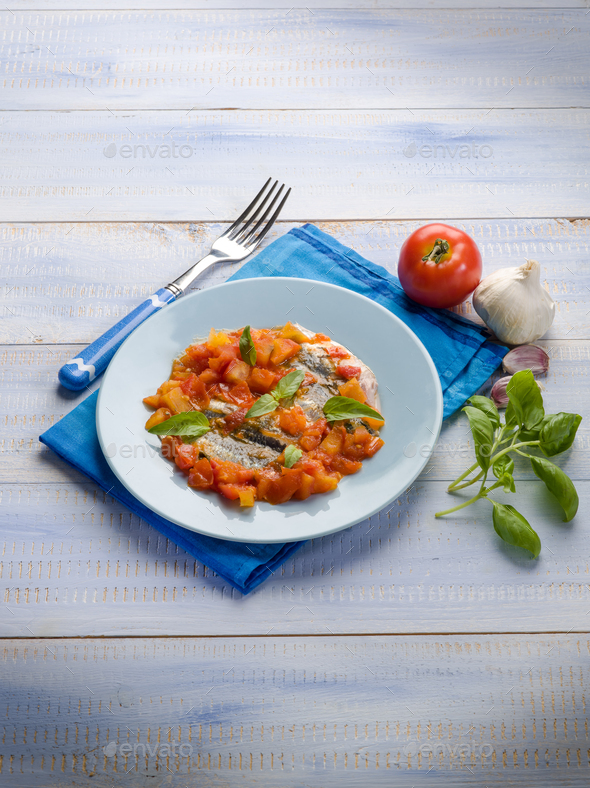 anchovy with capsicum and tomato sauce - Stock Photo - Images