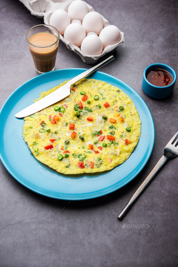 Indian Spiced Masala Omelet filled with fresh vegetable, healthy meal ...