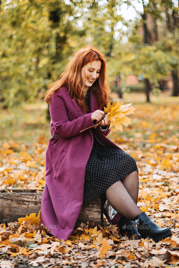 Mental Health In Autumn Happy Red Haired Woman Holding Yellow Maple