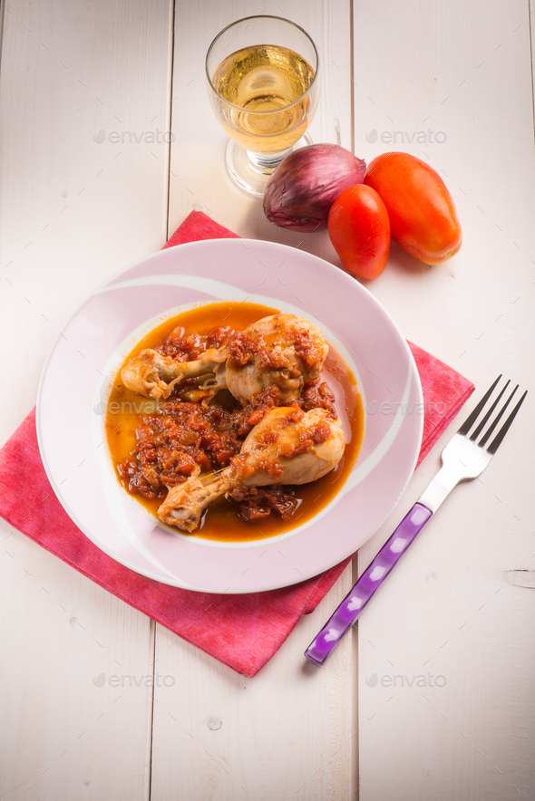 chicken leg with tomato sauce - Stock Photo - Images