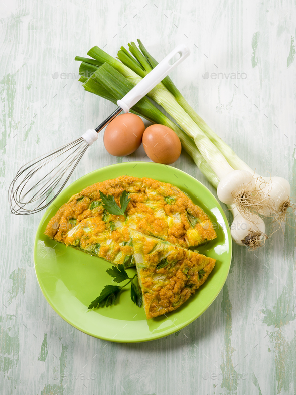 omelette with onions and leek - Stock Photo - Images
