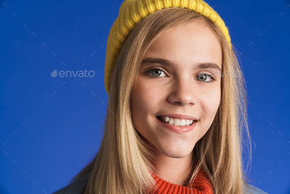 White girl wearing hat smiling and looking at camera - Stock Photo - Images