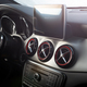 Dark luxury car Interior steering wheel shift lever and dashboard - PhotoDune Item for Sale
