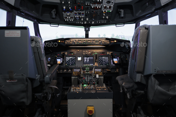 No people in empty plane cockpit with dashboard command Stock Photo by ...