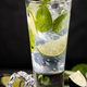 One glass of mojito cocktail with mint, lime and ice cubes - PhotoDune Item for Sale