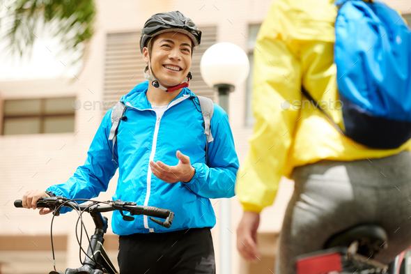 Happy Cyclist Talking to Girlfriend