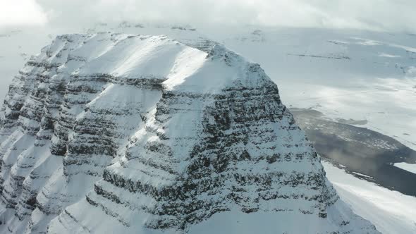 Bird's-eye View of the Snowy Mount Kirkjufetl. Iceland