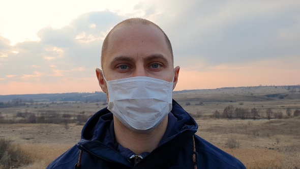 Face of a man in medical mask. alt