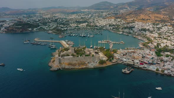 Drone View of Bodrum Ancient Kalesi Castle Harbor Full of Yachts and City alt