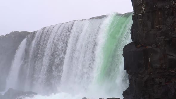 Thingverllir National Park Waterfall glacier melted Iceland Slow Motion Close Up