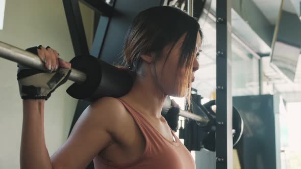Asian young sport woman wear sportswear workout exercise with barbell at fitness or gym stadium club alt