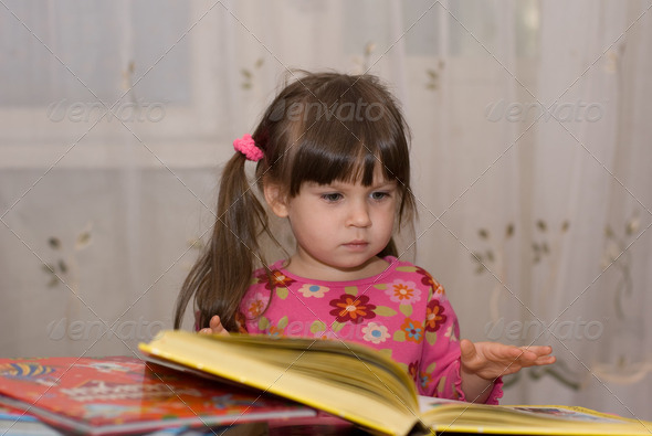 child reading the book