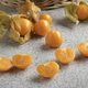 Fresh whole and halved Cape gooseberry, physalis, with husk close up - PhotoDune Item for Sale