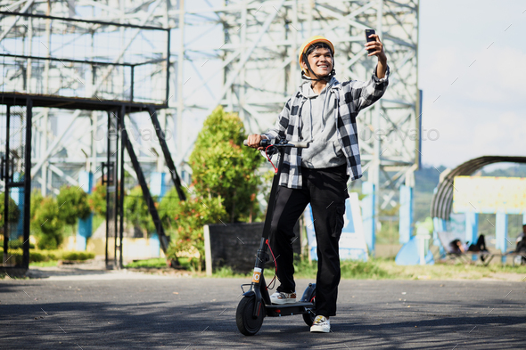 Electric scooter rider selfie