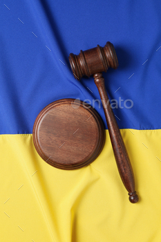 Ukrainian flag with judges gavel and soundboard