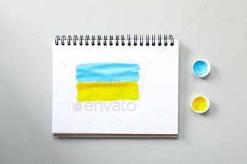 Composition for сoncept Save Ukraine on light gray background, top view